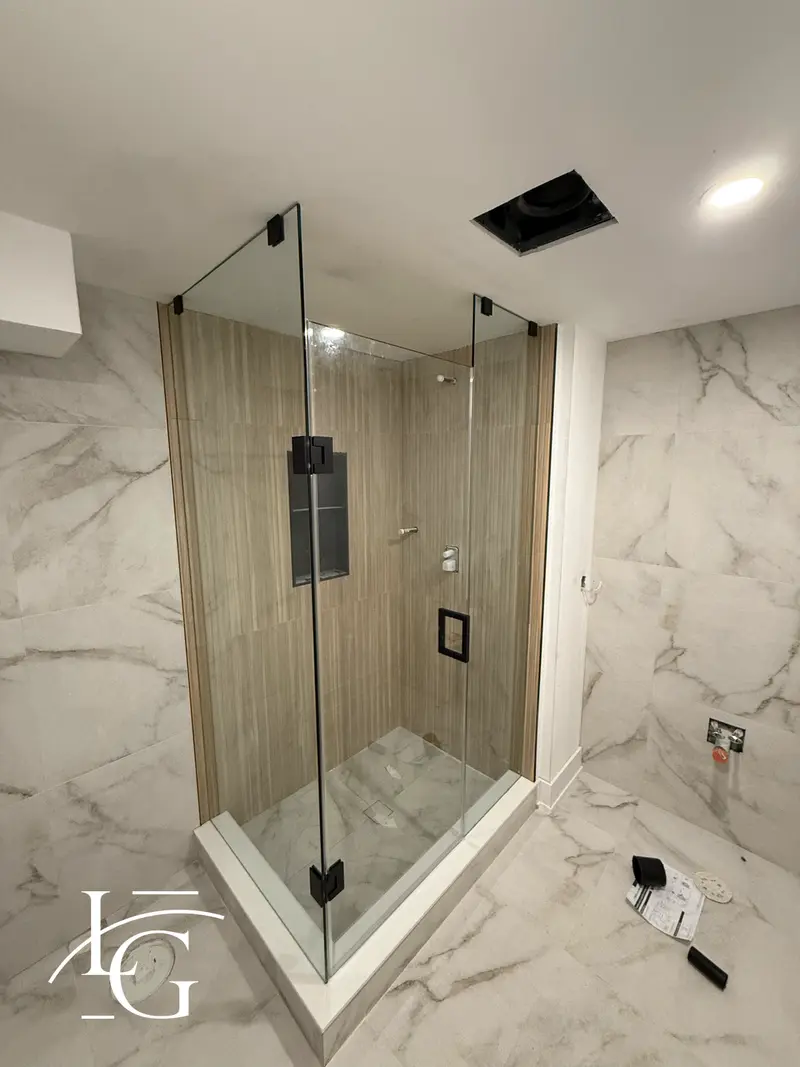 90-degree corner shower with black hardware