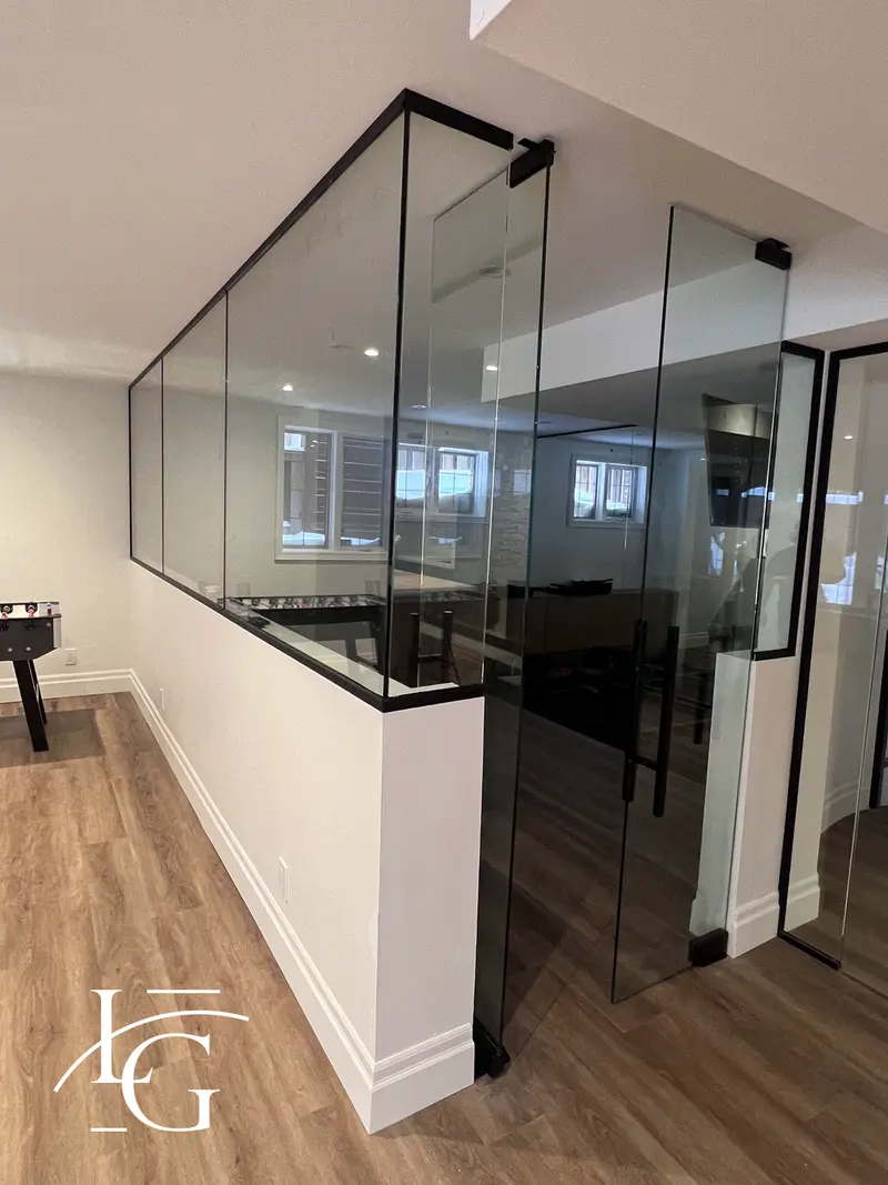 Full-height glass partition wall with door
