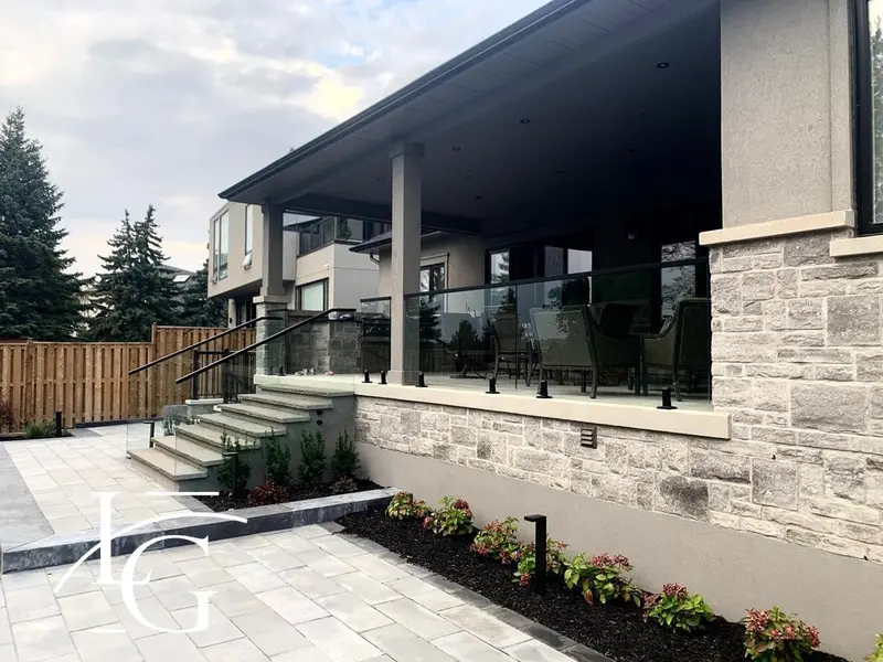 Covered porch glass railing with slim top rail, 10 mm — Burlington