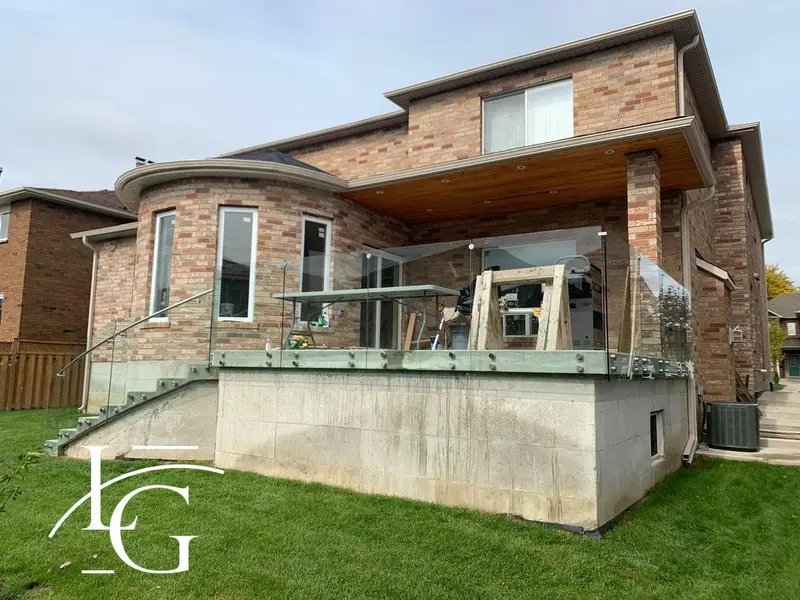 Curved frameless glass deck railing, CNC bent 12 mm — Oakville