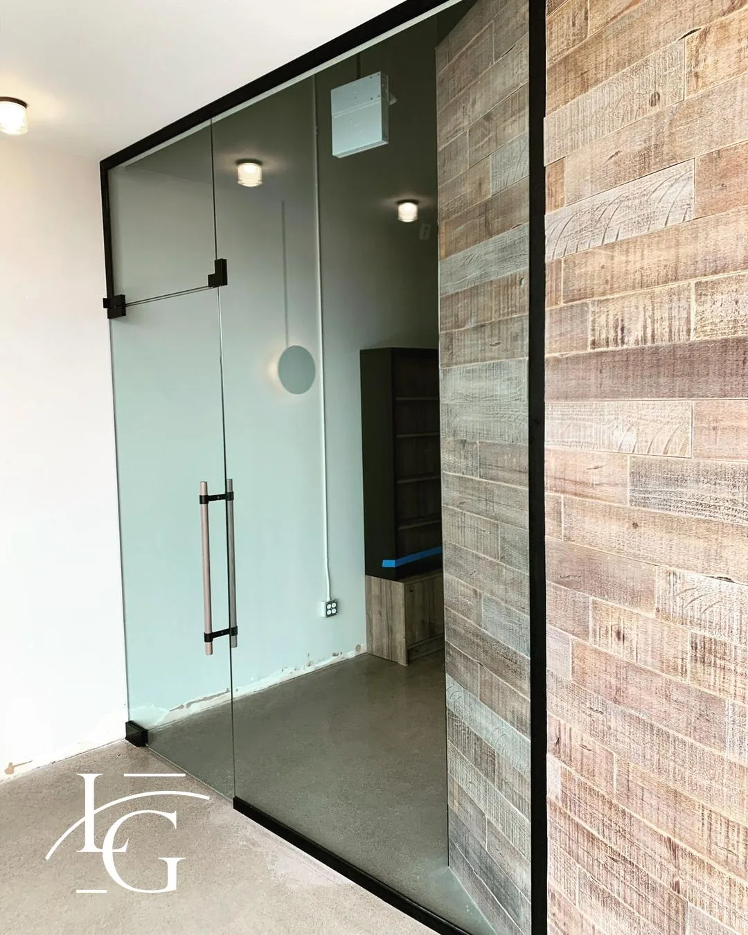 Frosted glass office entrance by Lux Glass — office glass partitions in Burlington