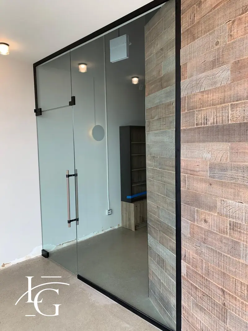 Frosted glass office entrance with acid-etch privacy band — Mississauga
