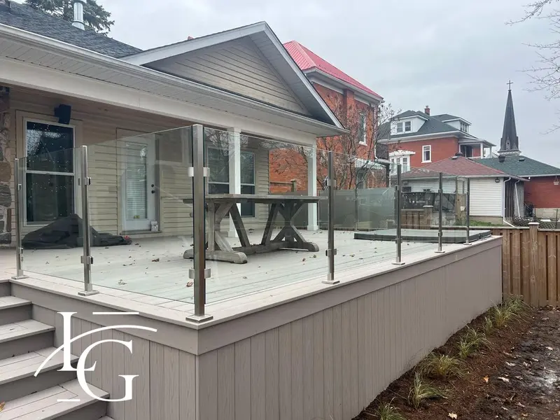 Post-system glass railing on a covered deck