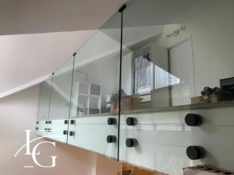Standoff glass railing on loft mezzanine, 12 mm tempered — Toronto