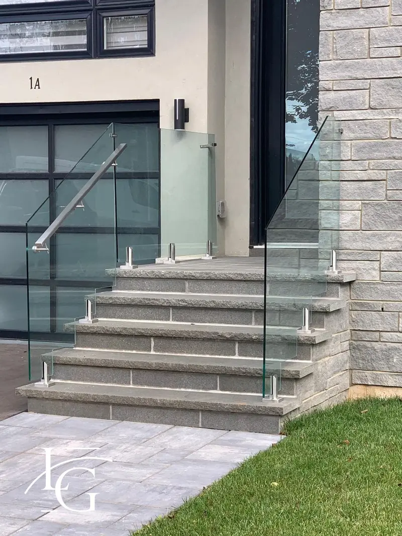 Spigot glass railing on stone steps, 12 mm tempered — Oakville