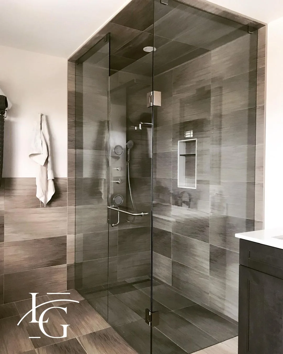 Three-piece frameless corner shower by Lux Glass — frameless shower enclosures for Vaughan homes