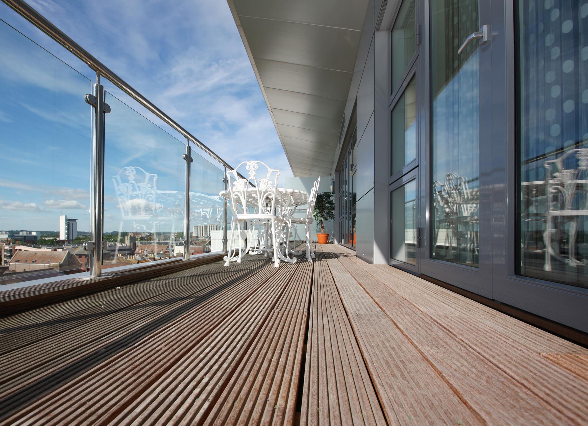 Exterior post glass railing — Oakville deck installation