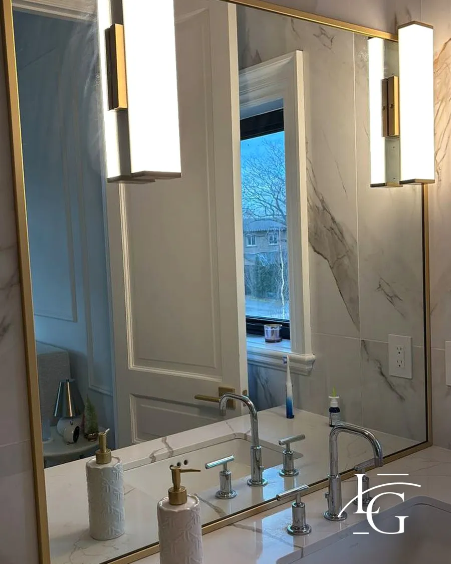 Custom mirror installed by Lux Glass in Oakville, brass and gold hardware