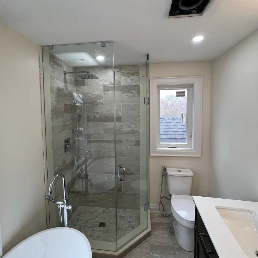 Frameless shower installed by Lux Glass in Cambridge, neo-angle