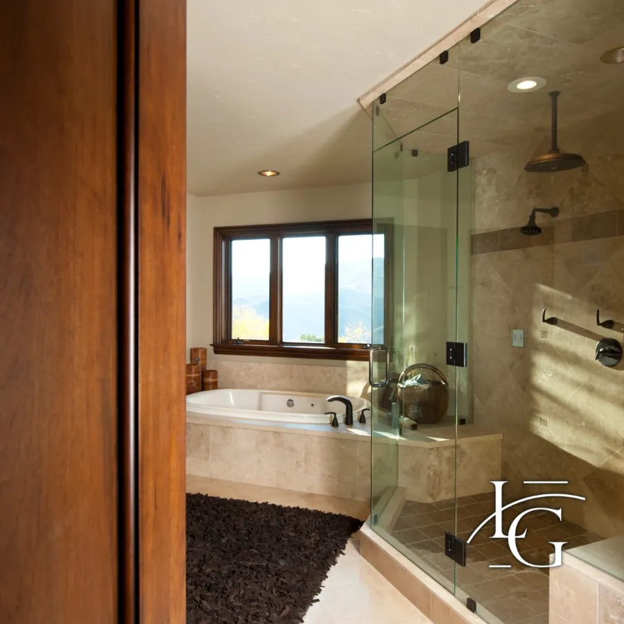 Frameless shower installed by Lux Glass in Vaughan, matte black hardware