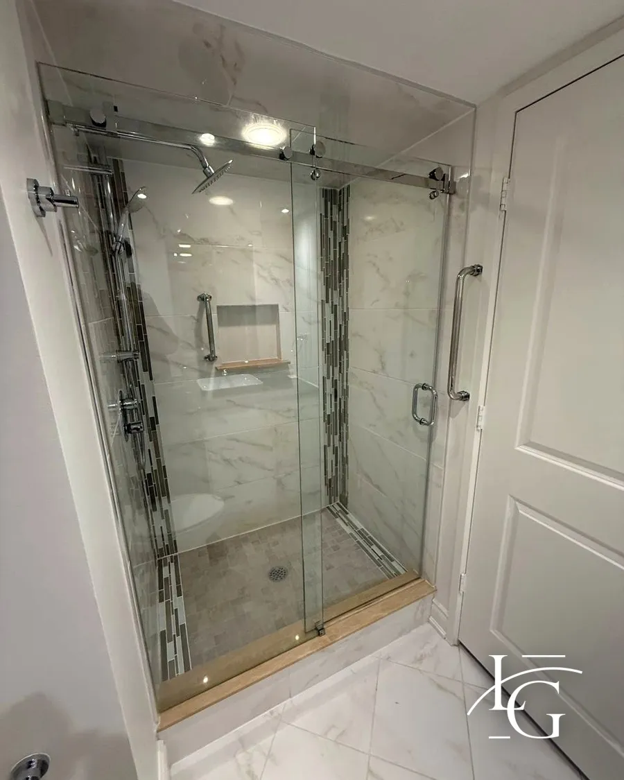Frameless shower installed by Lux Glass in Waterloo, chrome hardware, sliding door