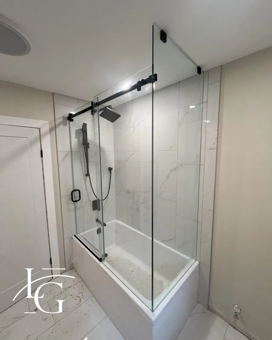Frameless shower installed by Lux Glass in Woodbridge, sliding door