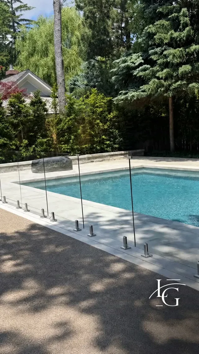 Glass pool fence installed by Lux Glass in Oakville, spigot-mounted