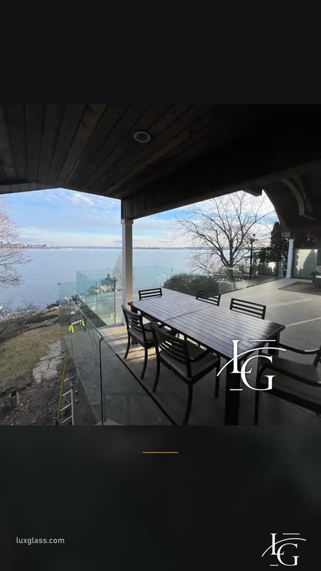 Glass railing installed by Lux Glass in Burlington, spigot-mounted, stair