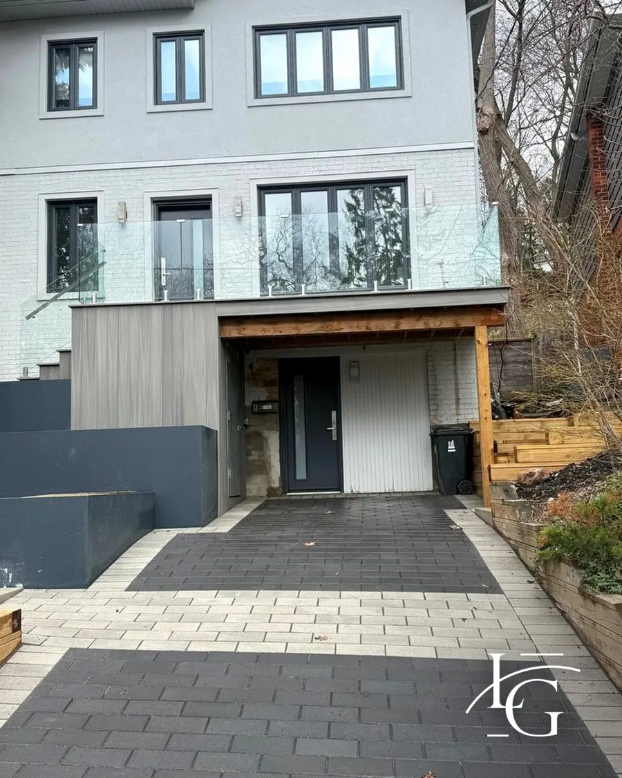 Glass railing installed by Lux Glass in Toronto, spigot-mounted, Juliet balcony